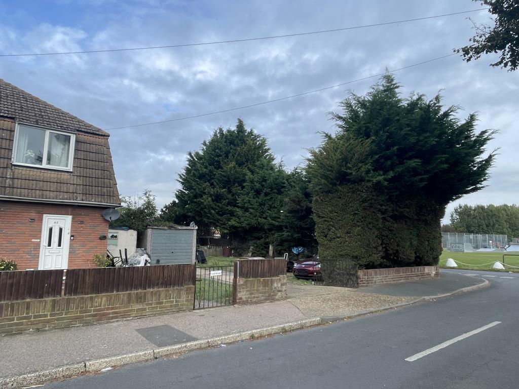 Lot: 106 - LAND WITH PLANNING FOR A PAIR OF SEMI-DETACHED HOUSES - View of land with planning for development